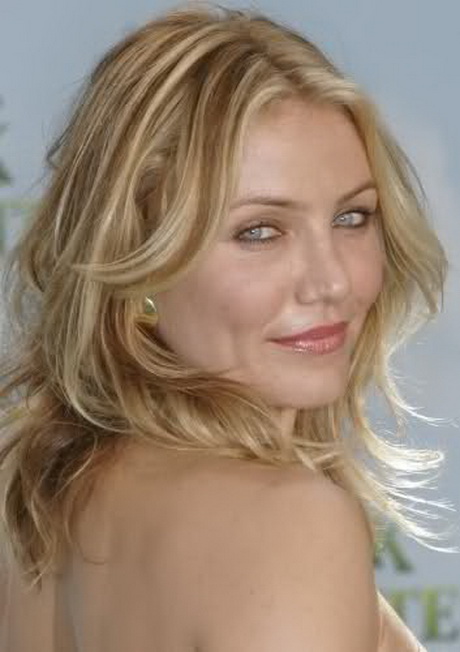 Braune strähnchen auf blondem haar  width=